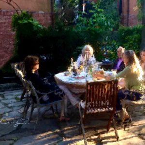 Neighbours Dining At Sunset